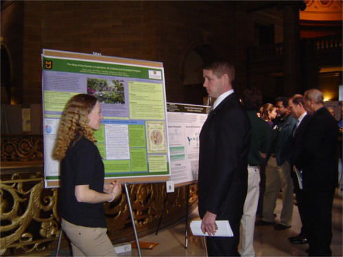 Presenting research to Senator Will Kraus at the state capitol